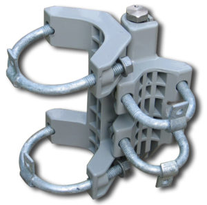 A universal self-closing spring hinge with 2 large u-bolts and 2 smaller u-bolts