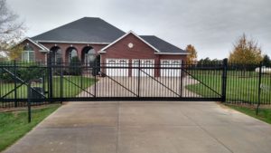 Ornamental cantilever driveway gate