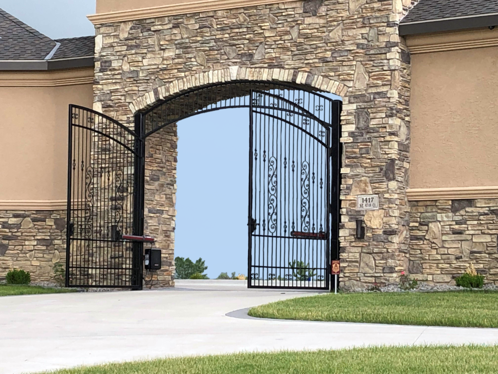 Open double swing estate gate with automated gate controls