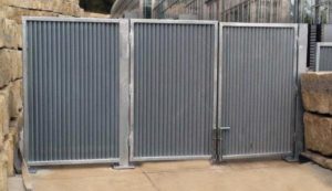 Vertical louver industrial swing gates at Lauritzen Gardens in Omaha, NE