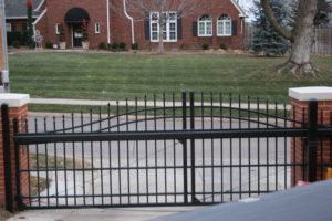 Residential cantilever gate - arched ornamental spear top gate