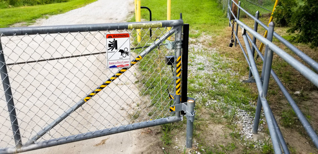 Gate safety sign and warning tags.